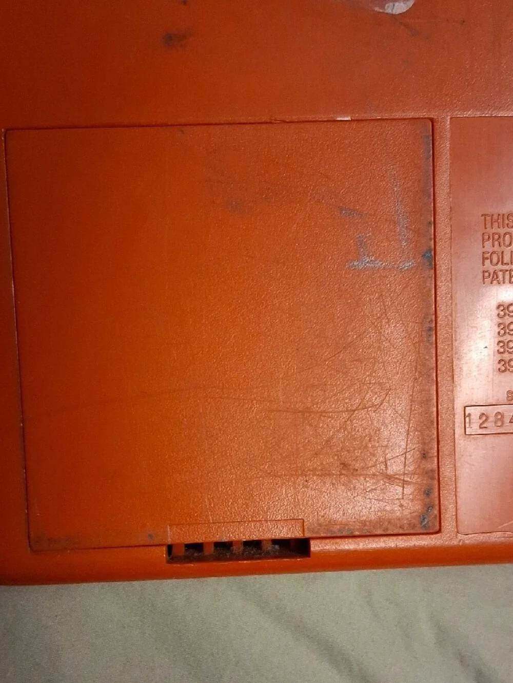 Texas Instruments Orange and Yellow Speak & Spell Handheld Learning Console
